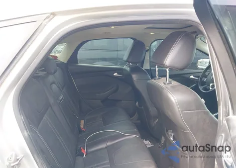 2013 Ford Focus Titanium z USA, uszkodzony, nr VIN 1FADP3N29DL194224